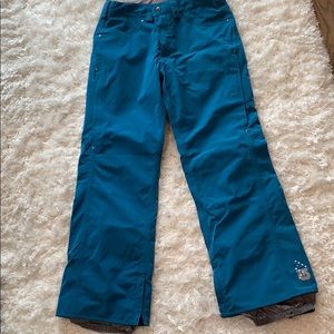 Women’s Burton DryFit snowboard pants in a beautiful teal blue color.